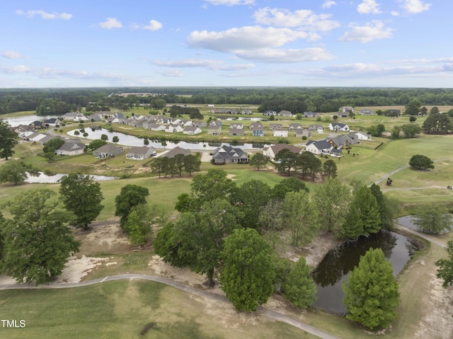 view of property location with nearby suburban area and a nearby body of water