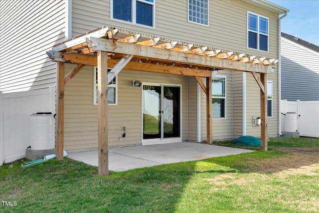 back of house featuring a pergola and a patio