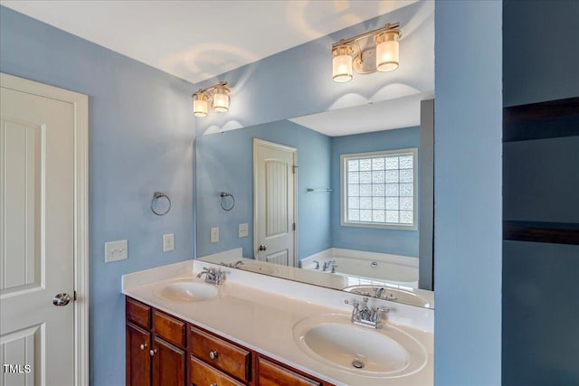bathroom with double vanity and a bath
