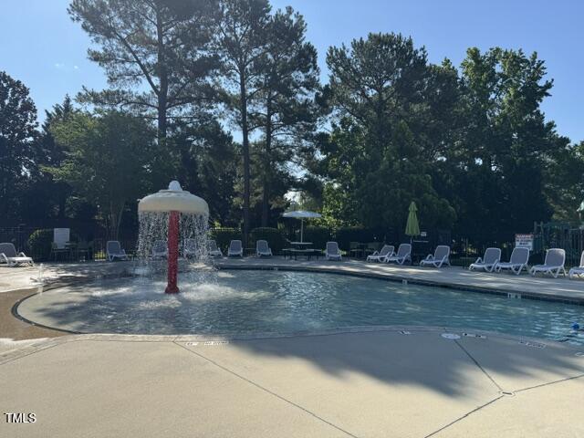 4109 Massey Preserve Trl, Raleigh, NC 27616 - community pool with a patio area