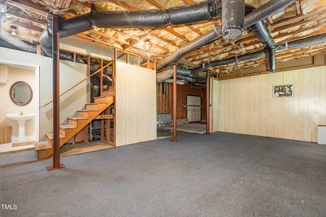 1720 Kingston Heath Way, Raleigh, NC 27604 - unfinished below grade area with carpet flooring, stairs, a sink, and wood walls