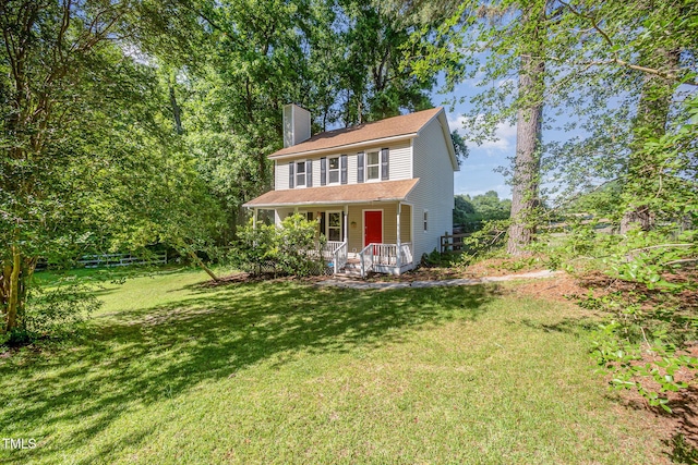 40 Crepe Myrtle Ct, Angier, NC 27501 - colonial house with a chimney, covered porch, and a front yard