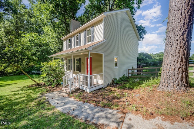 40 Crepe Myrtle Ct, Angier, NC 27501 - view of front of house with a porch and a chimney