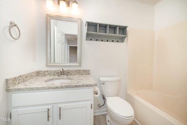 40 Crepe Myrtle Ct, Angier, NC 27501 - bathroom featuring vanity, toilet, and baseboards
