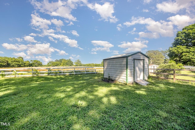 40 Crepe Myrtle Ct, Angier, NC 27501 - view of yard with a storage shed, an outdoor structure, and a view of countryside