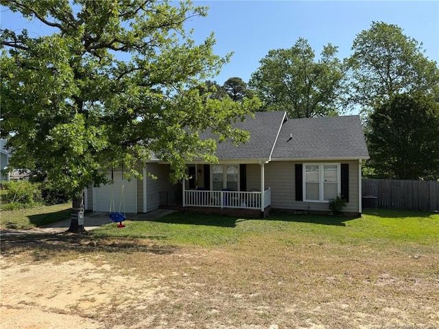 6651 Brookshire St, Fayetteville, NC 28314 - view of front of house featuring a porch, a garage, dirt driveway, and roof with shingles