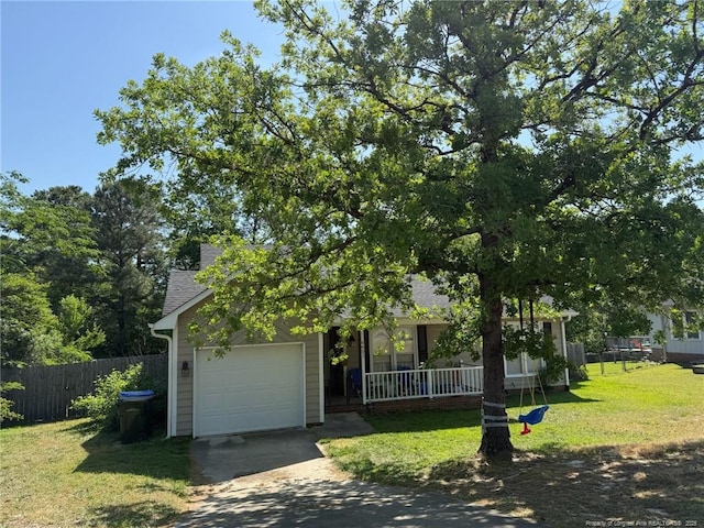 6651 Brookshire St, Fayetteville, NC 28314 - view of property hidden behind natural elements featuring concrete driveway, a porch, an attached garage, and a shingled roof