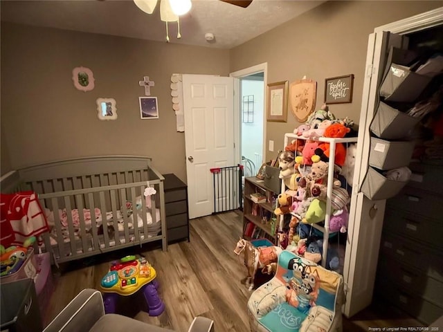6651 Brookshire St, Fayetteville, NC 28314 - bedroom with wood finished floors and a ceiling fan