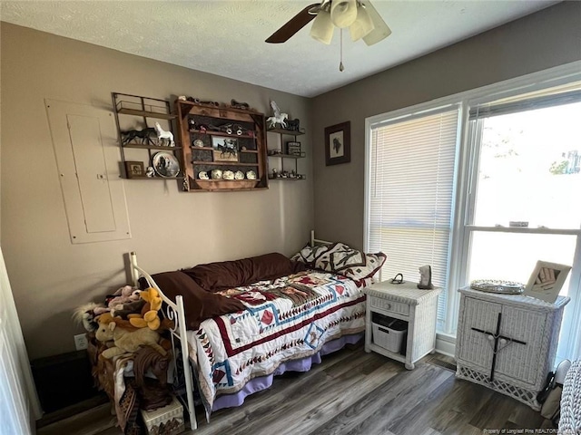 6651 Brookshire St, Fayetteville, NC 28314 - bedroom with wood finished floors, electric panel, and a ceiling fan