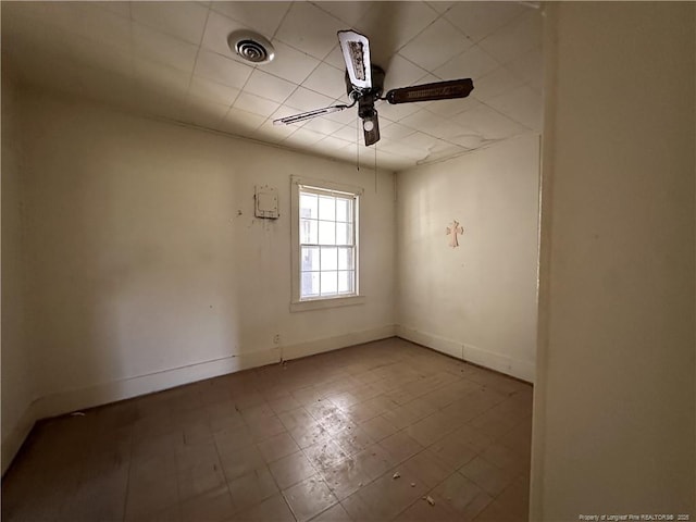 6695 Maxwell Rd, Stedman, NC 28391 - unfurnished room with a ceiling fan, baseboards, and tile patterned floors