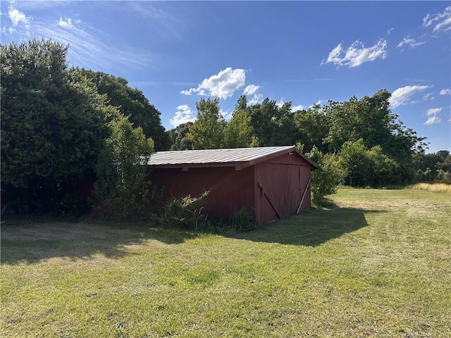 6695 Maxwell Rd, Stedman, NC 28391 - view of pole building with a lawn and a view of trees