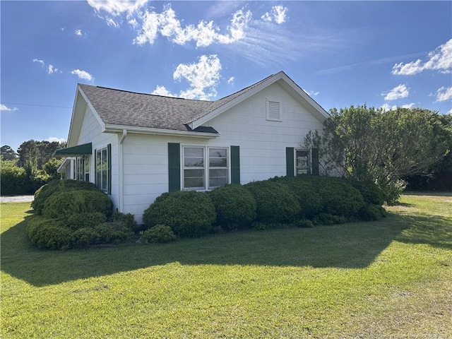 6695 Maxwell Rd, Stedman, NC 28391 - view of home's exterior featuring a yard and a shingled roof