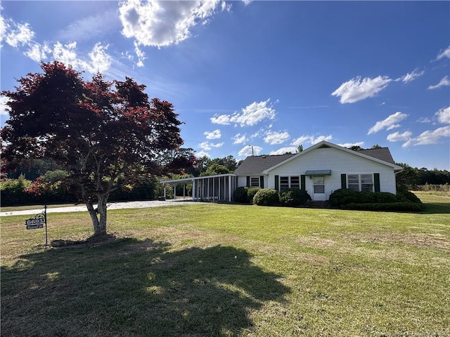 6695 Maxwell Rd, Stedman, NC 28391 - single story home with a front yard and a carport