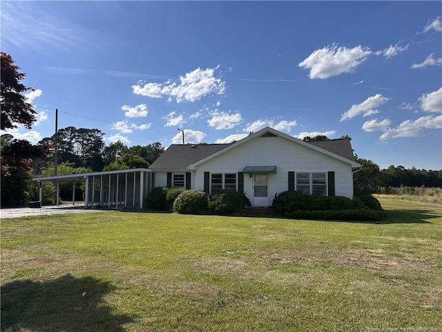 6695 Maxwell Rd, Stedman, NC 28391 - view of front of property with a front lawn and an attached carport