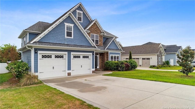 4323 Saleeby Way, Fayetteville, NC 28306 - view of front of house featuring concrete driveway, a front yard, and roof with shingles