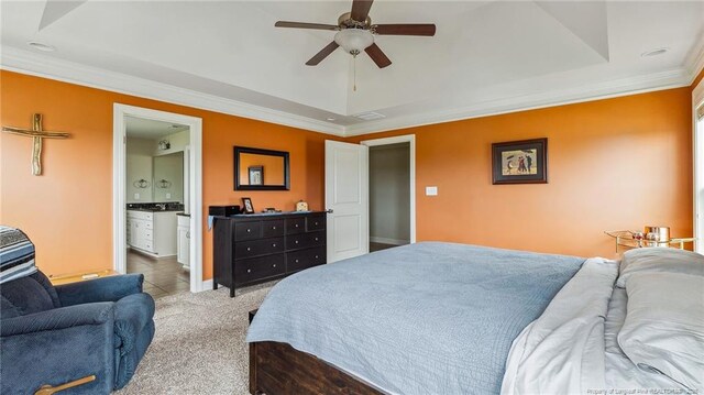 4323 Saleeby Way, Fayetteville, NC 28306 - carpeted bedroom featuring ornamental molding, recessed lighting, a tray ceiling, a ceiling fan, and tile patterned flooring