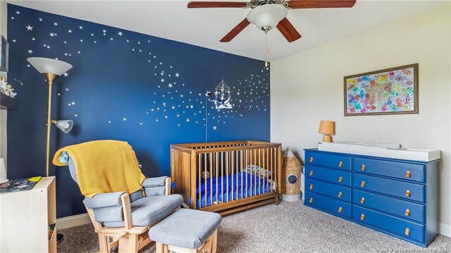 4323 Saleeby Way, Fayetteville, NC 28306 - carpeted bedroom with a nursery area, a ceiling fan, and baseboards
