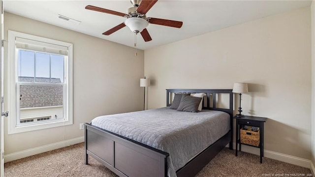 4323 Saleeby Way, Fayetteville, NC 28306 - bedroom with baseboards, light carpet, and a ceiling fan