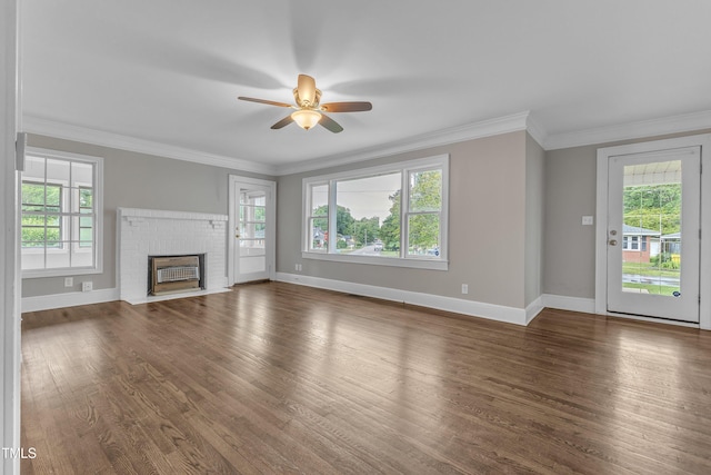 302 Hester St, Knightdale, NC 27545 - unfurnished living room featuring healthy amount of natural light, baseboards, and crown molding