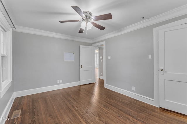 302 Hester St, Knightdale, NC 27545 - empty room with ceiling fan, wood finished floors, crown molding, and baseboards