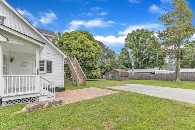 302 Hester St, Knightdale, NC 27545 - view of yard featuring stairway and a patio area