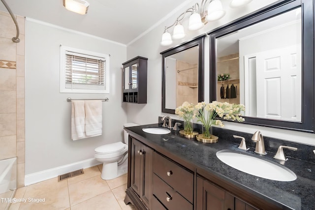bathroom featuring tile patterned floors, crown molding, baseboards, toilet, and double vanity