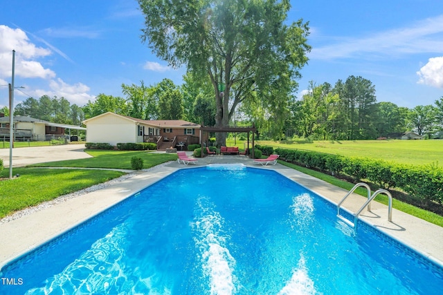 outdoor pool featuring a pergola, a yard, a patio area, and a deck