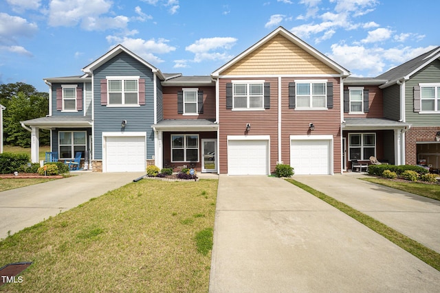 3403 Cardinal Lake Dr, Durham, NC 27704 - view of front facade with driveway, a garage, a front lawn, and stone siding