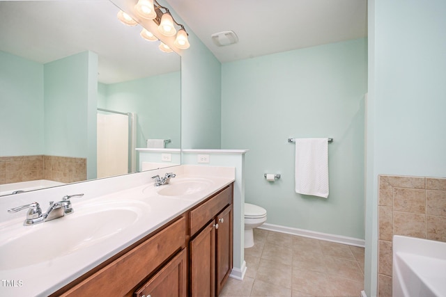 3403 Cardinal Lake Dr, Durham, NC 27704 - full bathroom with a garden tub, double vanity, a stall shower, and toilet