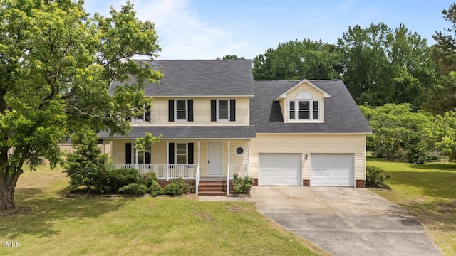 114 Lynnville Ct, Lillington, NC 27546 - view of front of home featuring covered porch, concrete driveway, a front lawn, and a garage