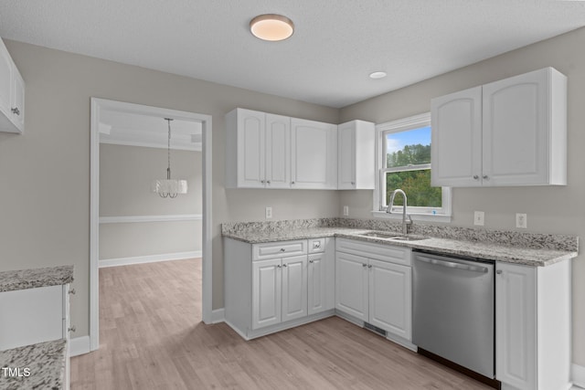 114 Lynnville Ct, Lillington, NC 27546 - kitchen featuring stainless steel dishwasher, a sink, light wood-type flooring, white cabinetry, and a textured ceiling
