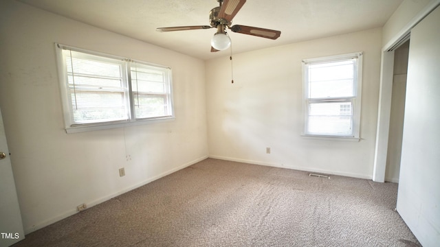 2121 Lombardy Dr, Fayetteville, NC 28304 - empty room with carpet flooring, ceiling fan, and baseboards