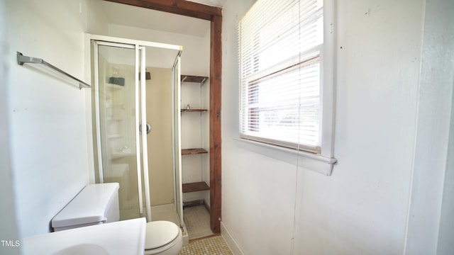 2121 Lombardy Dr, Fayetteville, NC 28304 - bathroom with a shower stall and toilet