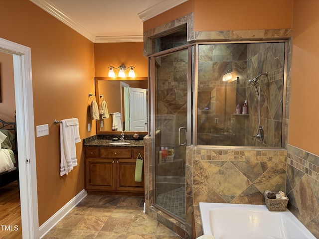 full bath with crown molding, a shower stall, a bath, vanity, and baseboards