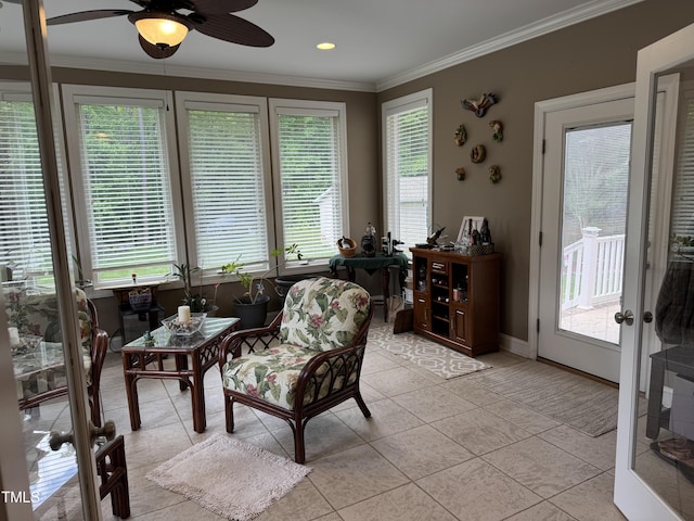 sunroom with plenty of natural light, ornamental molding, tile patterned flooring, french doors, and baseboards