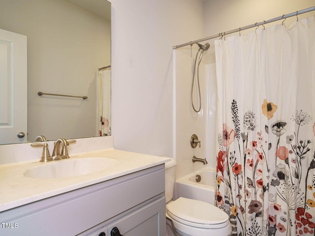 full bathroom featuring vanity, toilet, and shower / bathtub combination with curtain