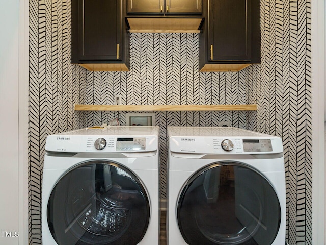 laundry area featuring cabinet space and washer and dryer