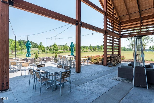 view of patio / terrace with an outdoor living space and a gazebo