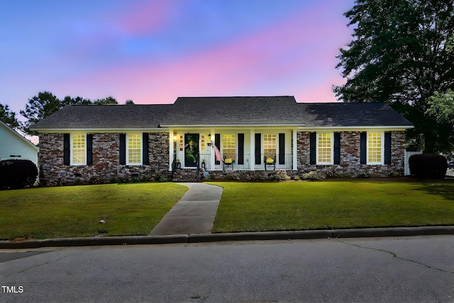 203 Marlowe Dr, Dunn, NC 28334 - single story home with a front lawn and covered porch