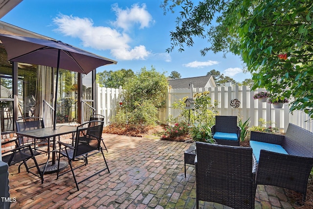 203 Marlowe Dr, Dunn, NC 28334 - view of patio / terrace with a fenced backyard and outdoor dining space