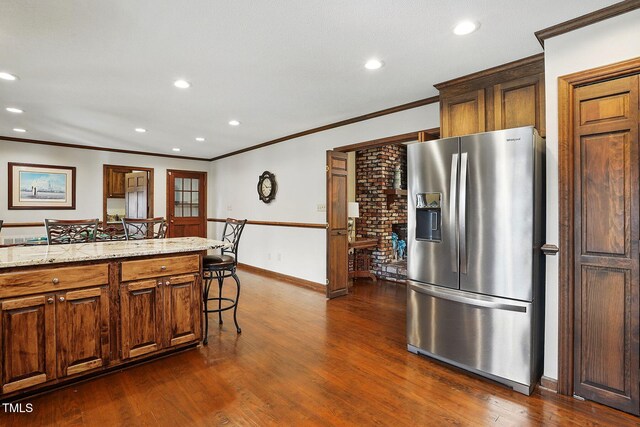203 Marlowe Dr, Dunn, NC 28334 - kitchen featuring stainless steel fridge with ice dispenser, crown molding, baseboards, recessed lighting, and dark wood-type flooring