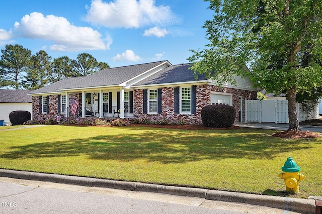 203 Marlowe Dr, Dunn, NC 28334 - single story home featuring an attached garage, covered porch, and brick siding