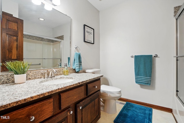 203 Marlowe Dr, Dunn, NC 28334 - bathroom with a shower with door, vanity, and toilet