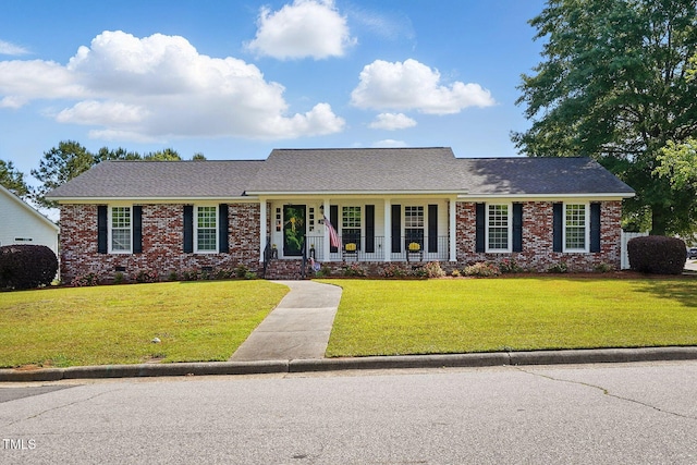 203 Marlowe Dr, Dunn, NC 28334 - view of front of property with a porch, a front lawn, brick siding, and a shingled roof