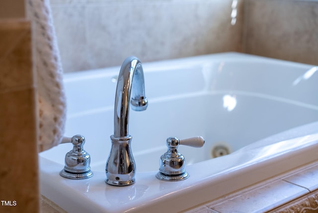 bathroom view of a sink and a tub