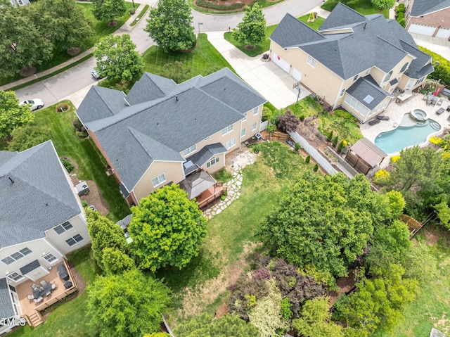 aerial view of residential area with a pool