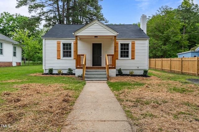 306 Coleman St, Oxford, NC 27565 - bungalow-style home featuring a chimney and a shingled roof