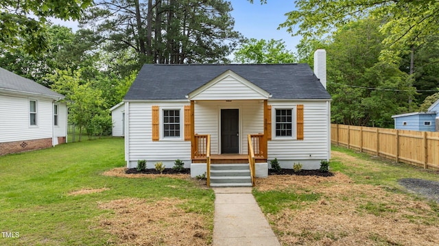 306 Coleman St, Oxford, NC 27565 - bungalow-style home with a chimney and a shingled roof
