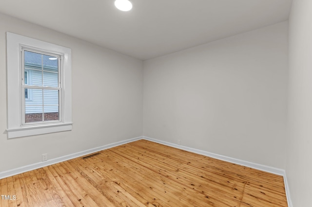 306 Coleman St, Oxford, NC 27565 - empty room featuring baseboards and light wood-style floors