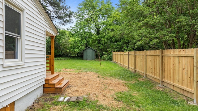 306 Coleman St, Oxford, NC 27565 - view of yard with a storage unit and an outbuilding